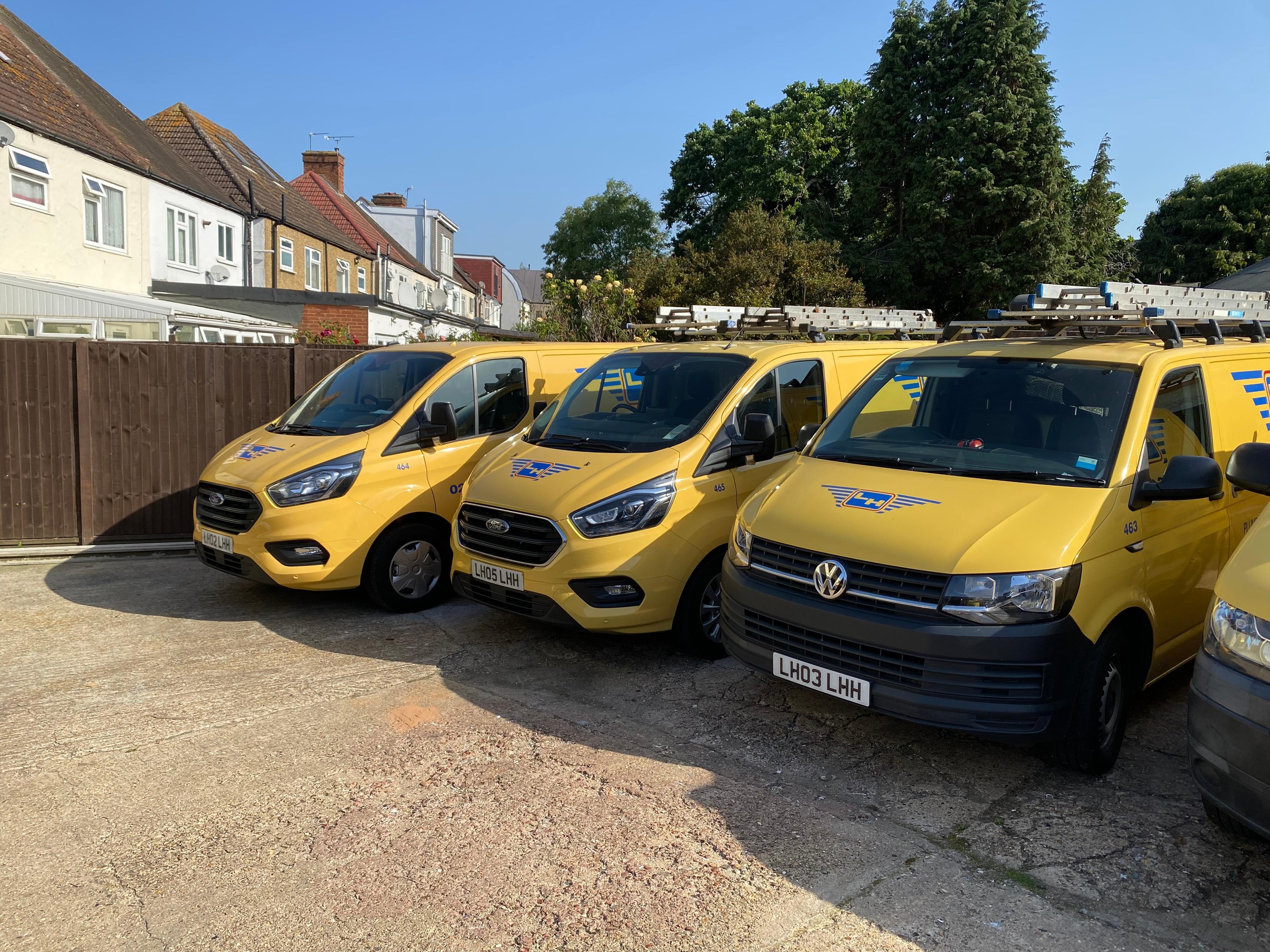 LH Plumbing & Heating Yellow Vans